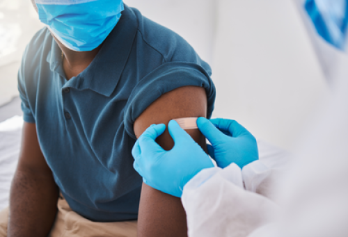 person receiving vaccine shot 