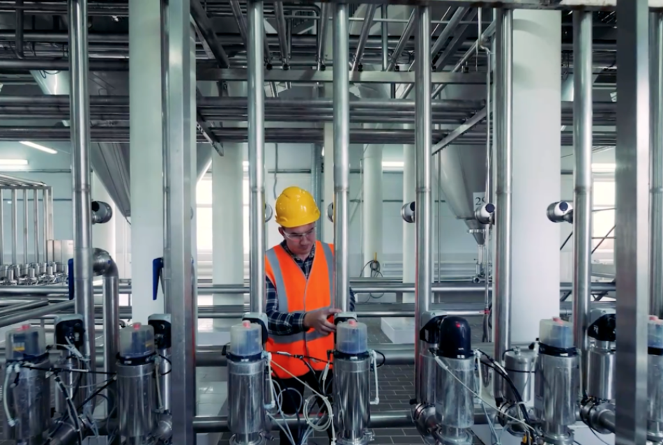 Operator working on industrial machine