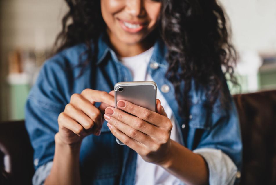 Woman scrolling phone
